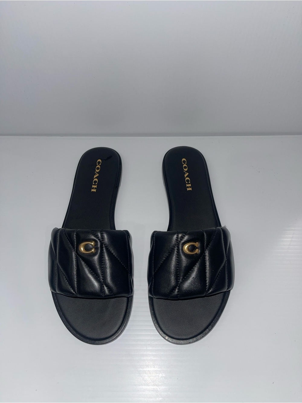 COACH Black Quilted Leather Slide Sandals with Gold Logo